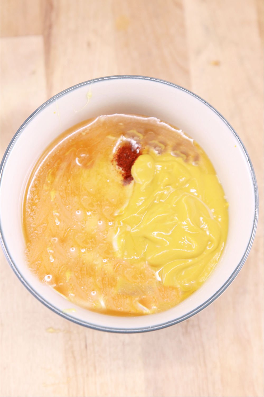 bowl with mustard, honey and spices