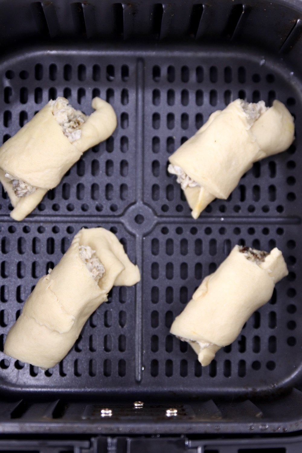 Air fryer with sausage filled crescent dough