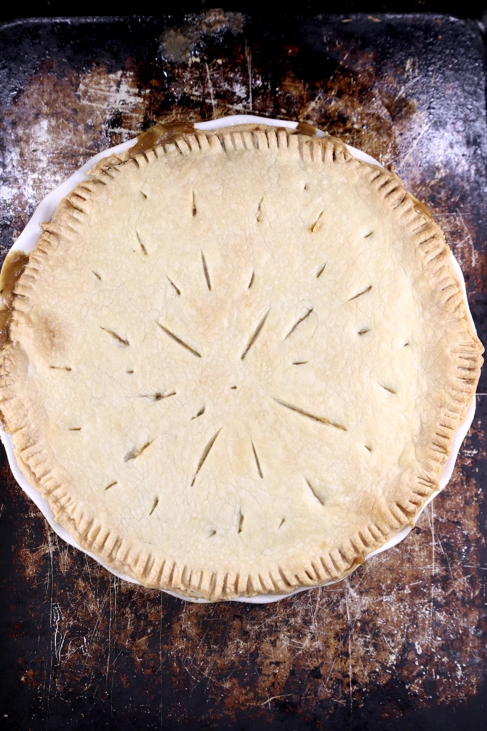 Baked crawfish pie on a baking sheet
