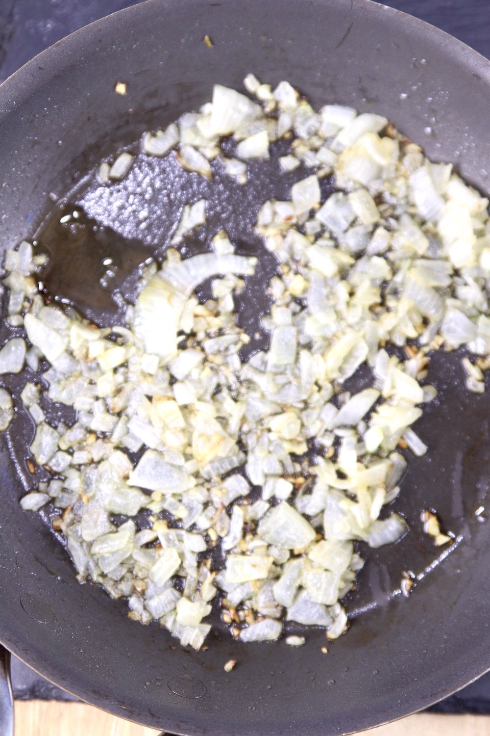 cooked onion and garlic in a skillet