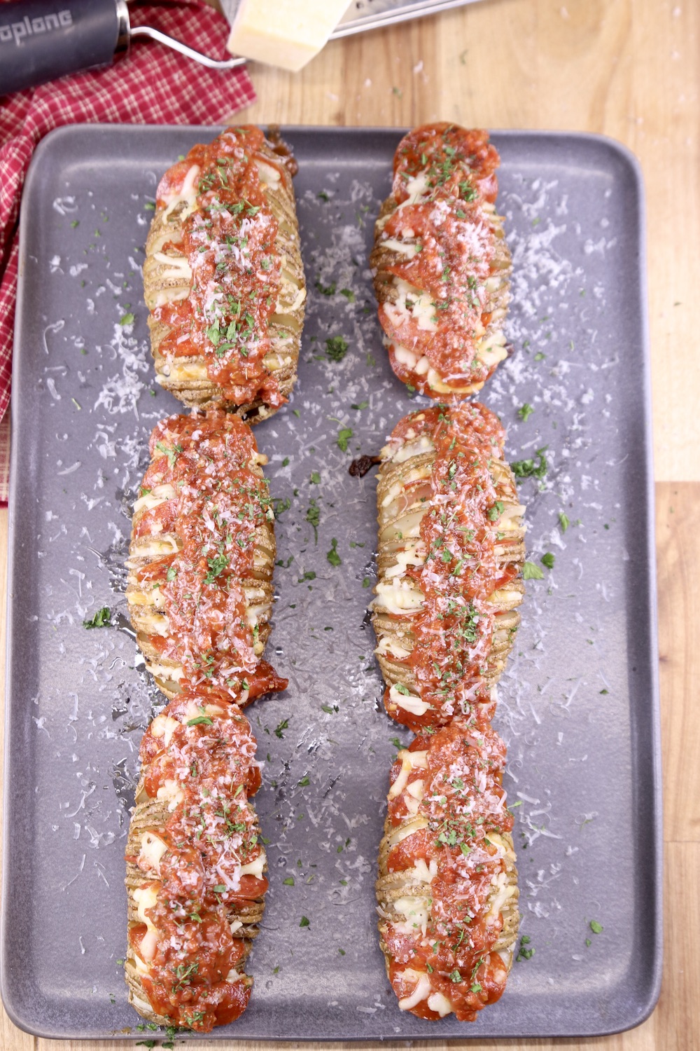 Hasselback potatoes with pizza toppings