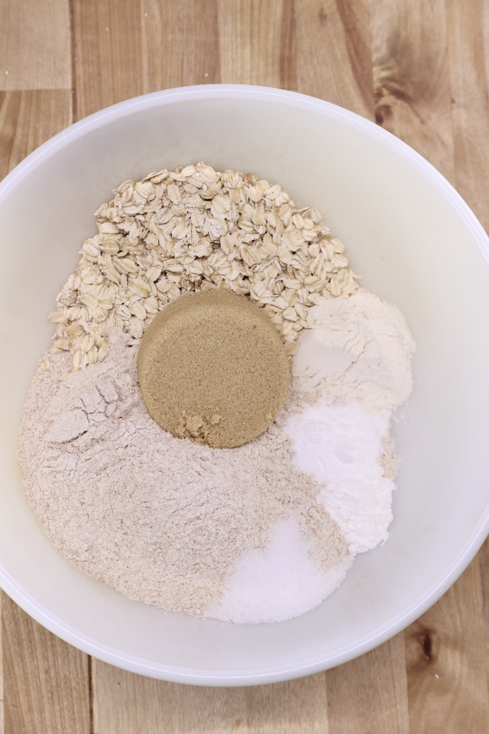 Bowl with flour, oats, brown sugar for Irish Brown Bread