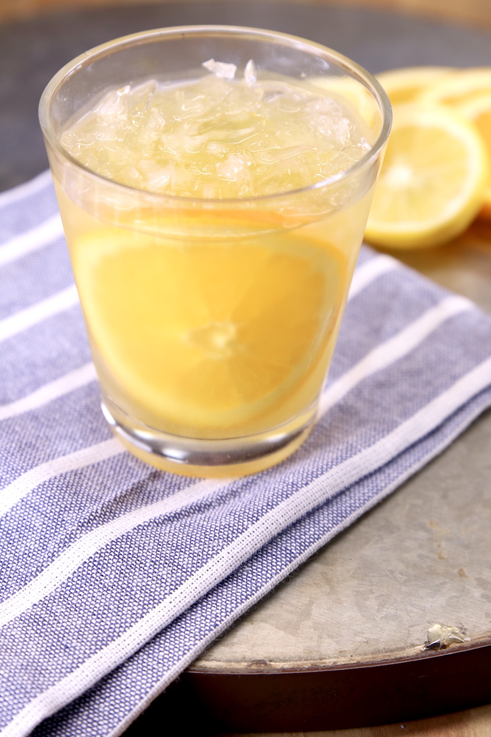 Whiskey sour cocktail with orange slice in the glass for garnish