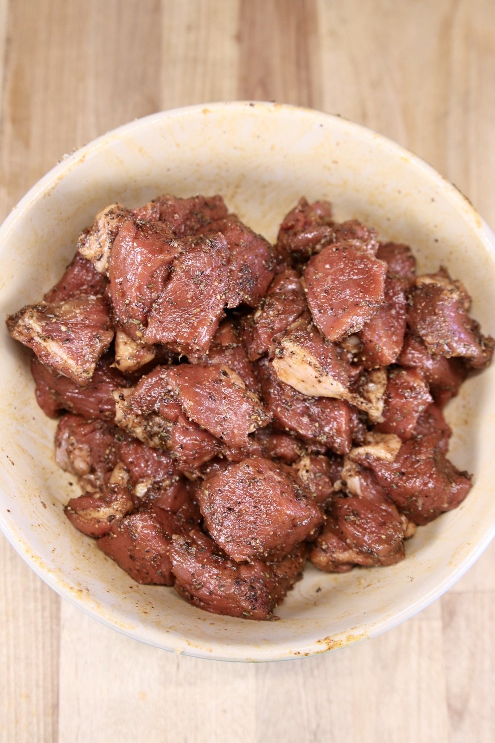 bowl of sirloin chunks with dry rub