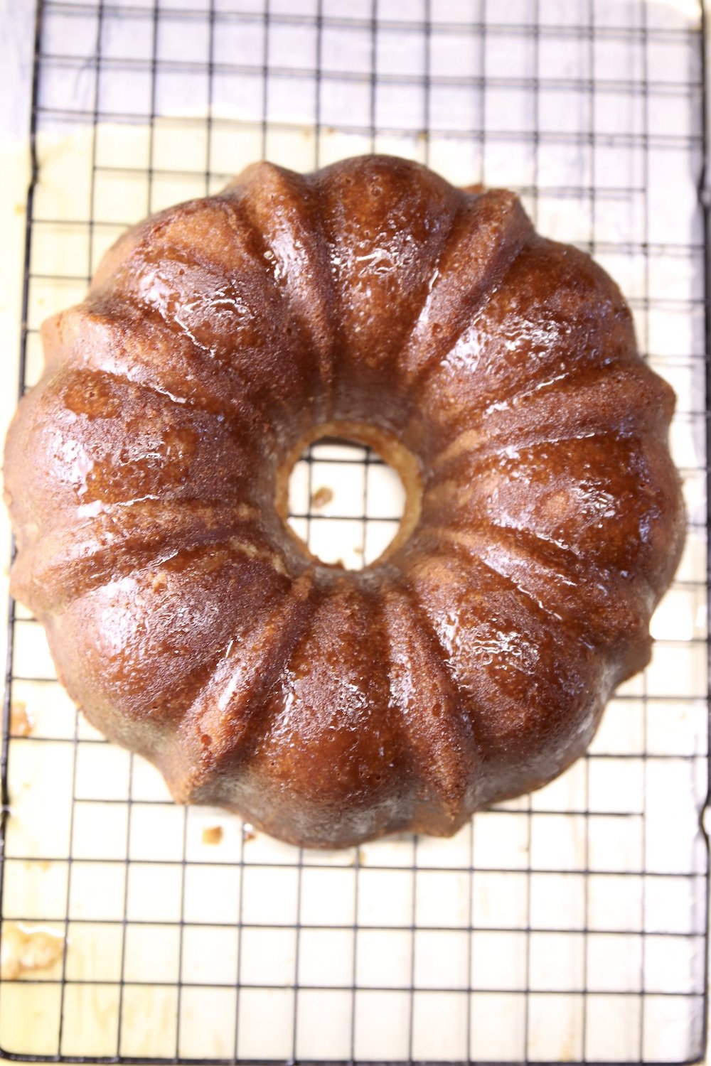 glazed bundt cake on a wire rack
