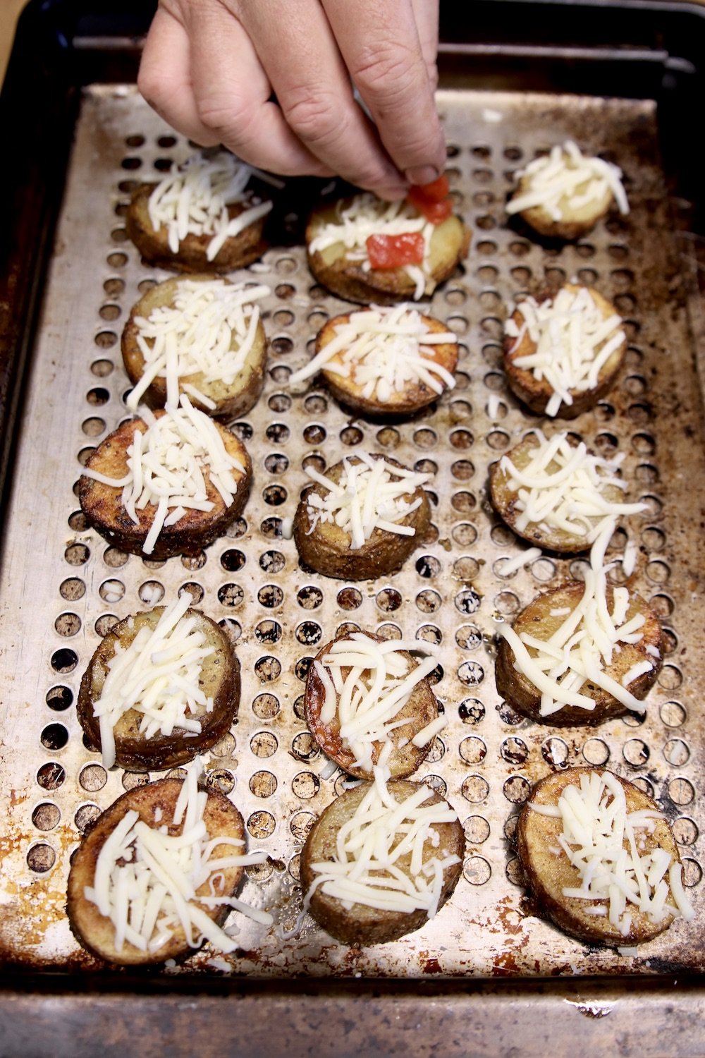 potato slices with shredded mozzarella