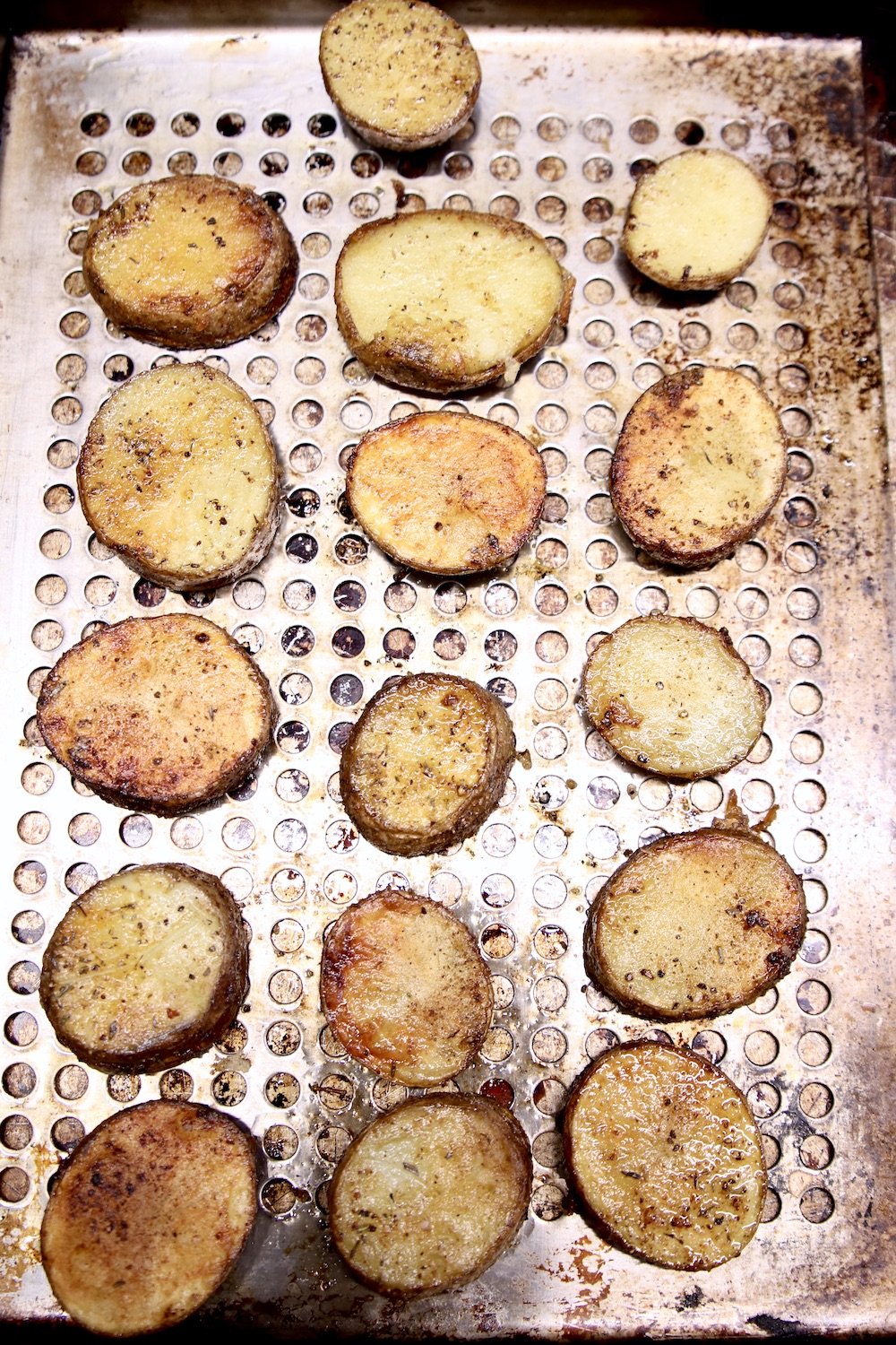 fried potato slices on a grill pan