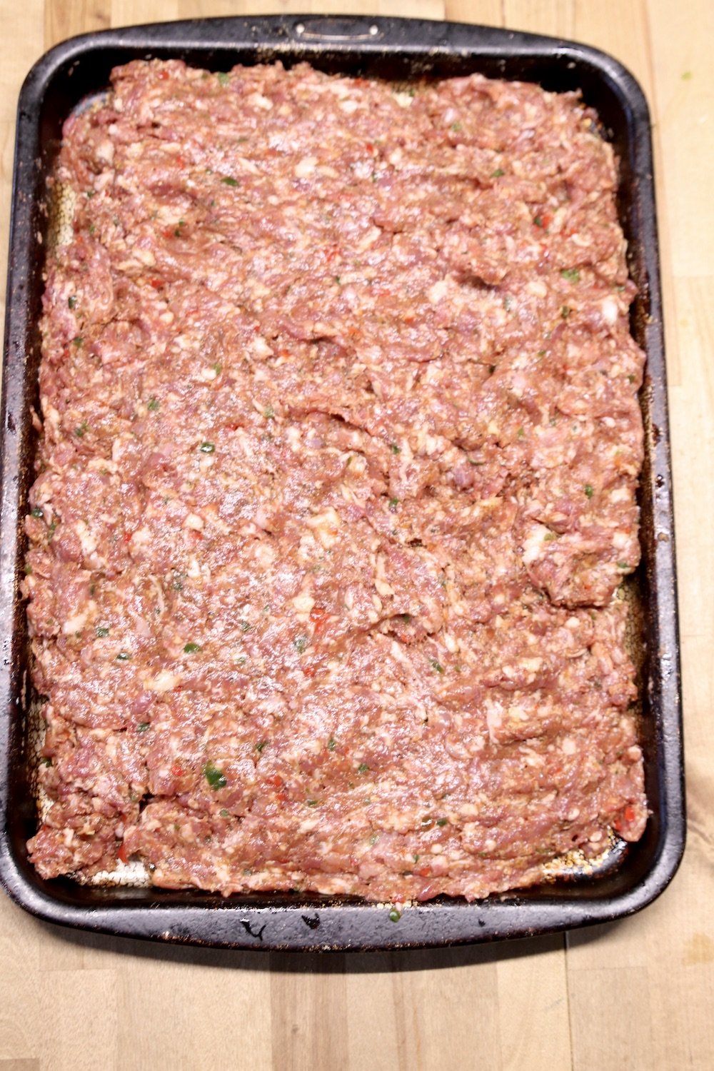 sheet pan of sausage mixture