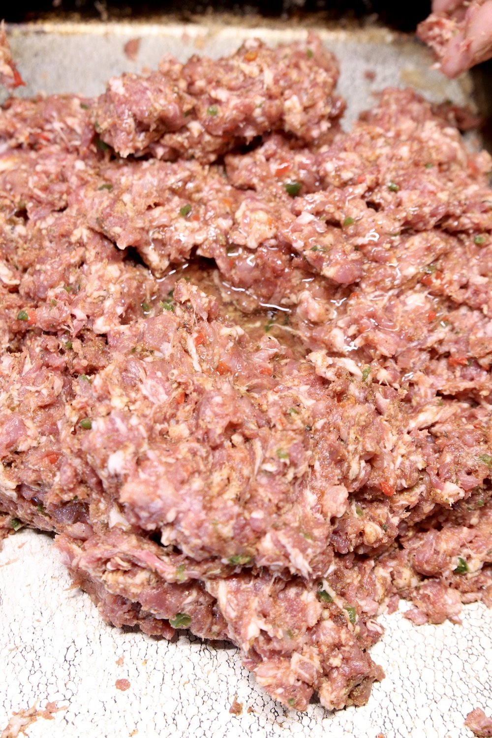 ground pork mixture on a sheet pan