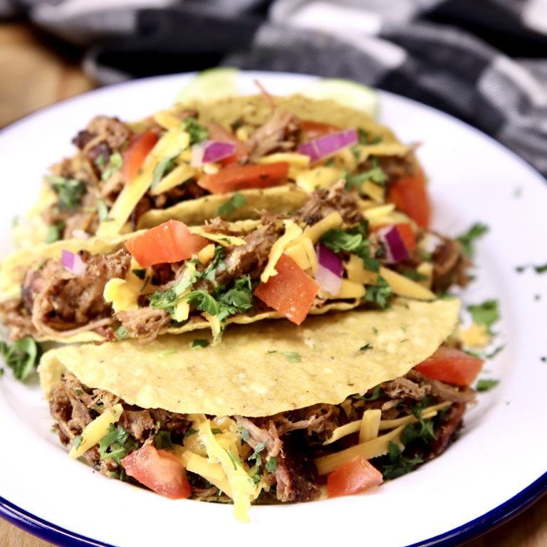 3 Pork Tacos with tomatoes, onion cilantro