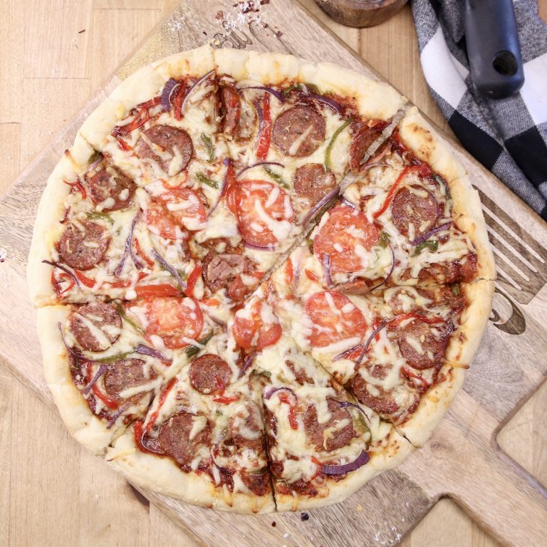 Smoked Sausage Pizza on a cutting board