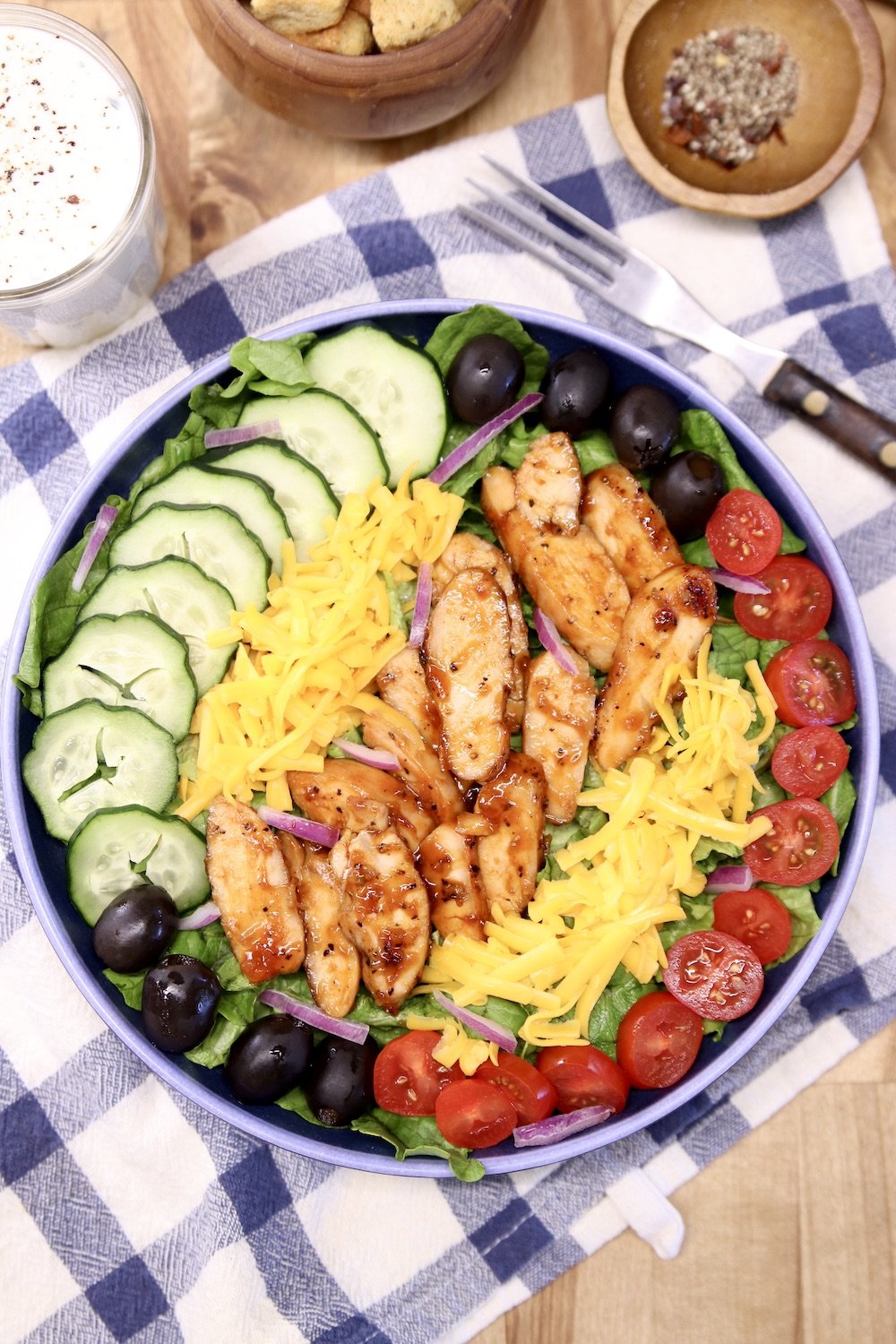 BBQ Chicken salad with ranch dressing and croutons to the side