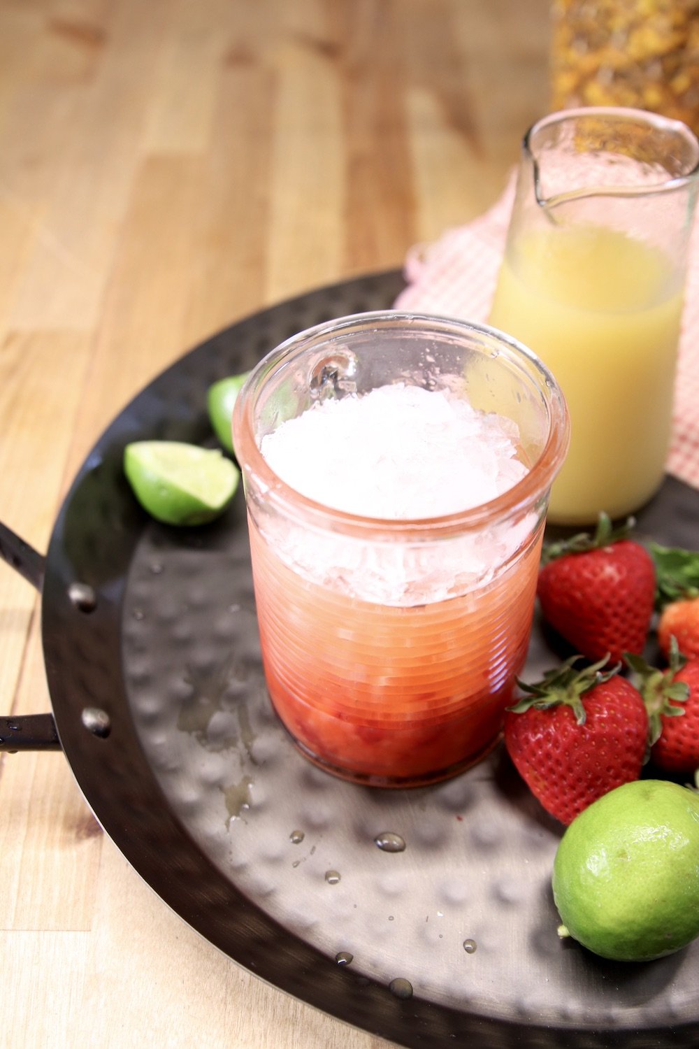 making a mojito with strawberries