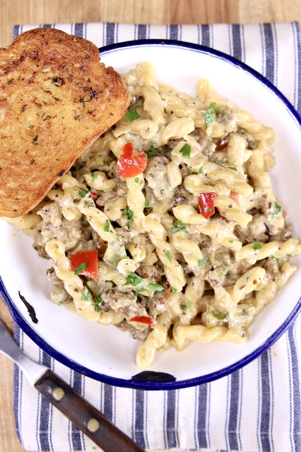 Creamy Italian Sausage Pasta with garlic bread