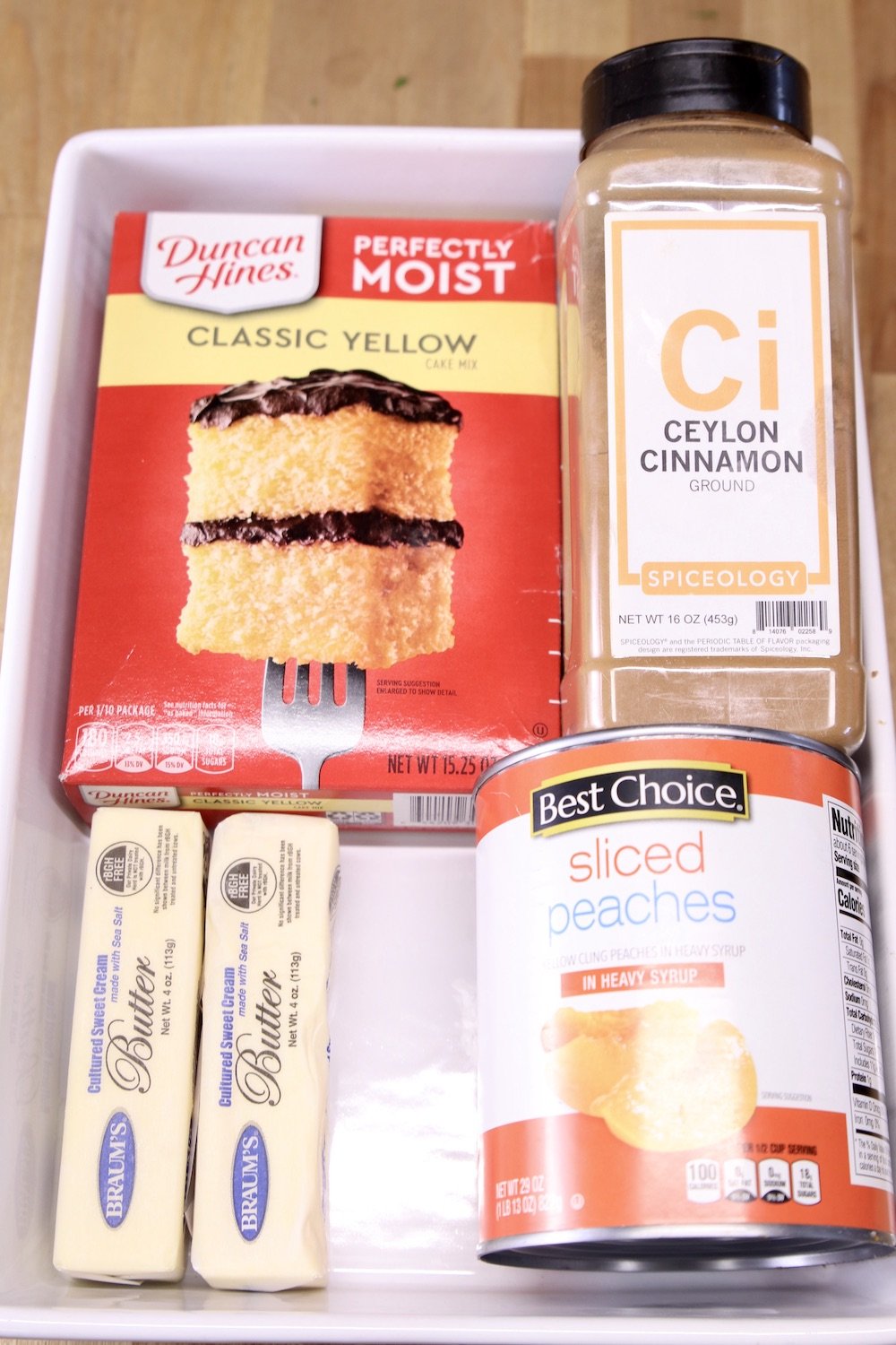 Cake mix, cinnamon, butter and can peaches