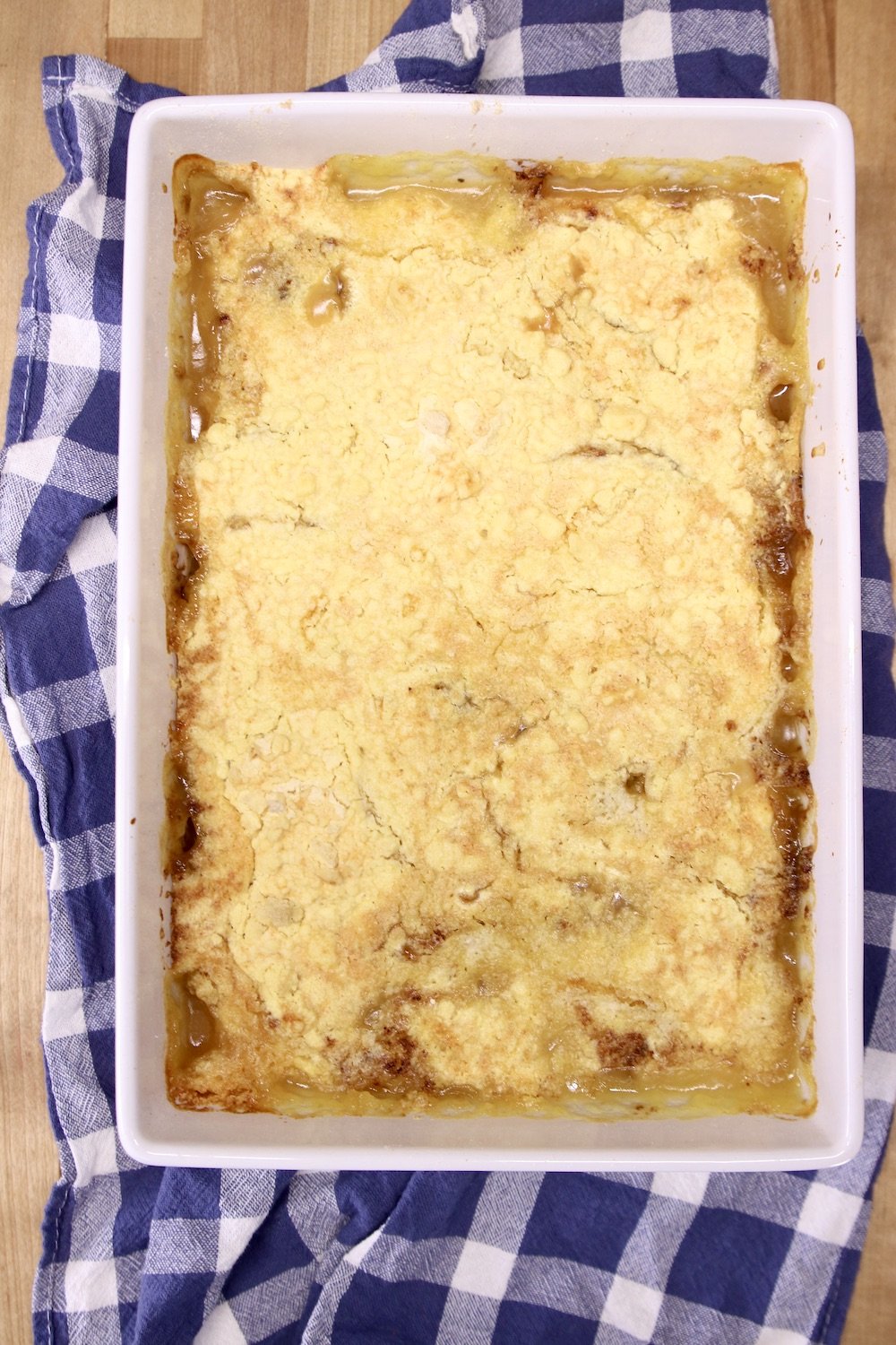 baked peach dump cake in a 9 x 13 cake pan