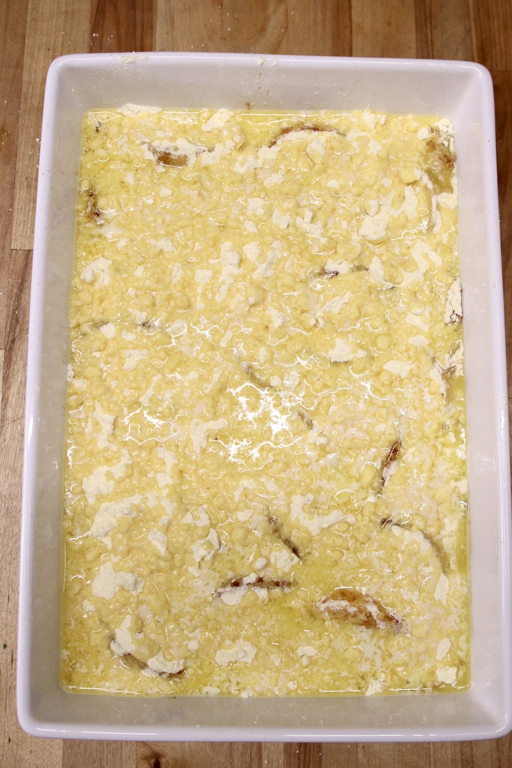melted butter poured over dry cake mix