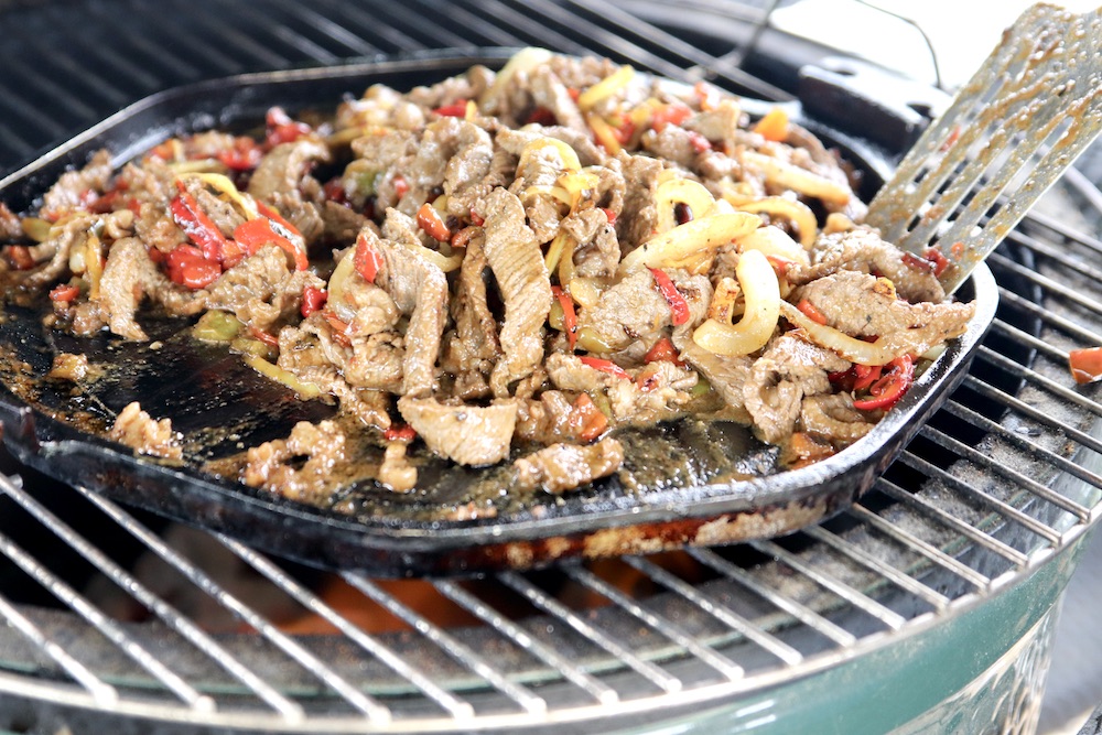 grilling steak fajitas on a griddle