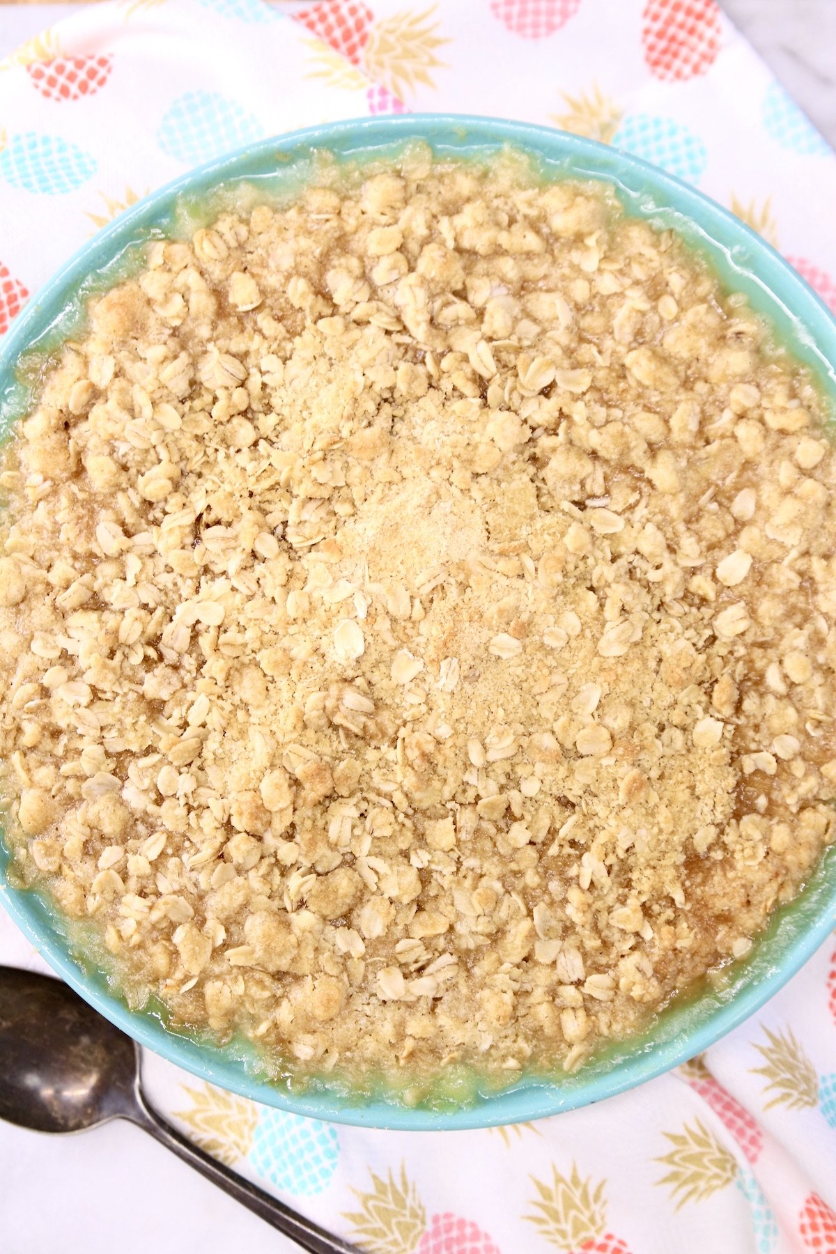 Pineapple Crisp in a blue pie plate - overhead