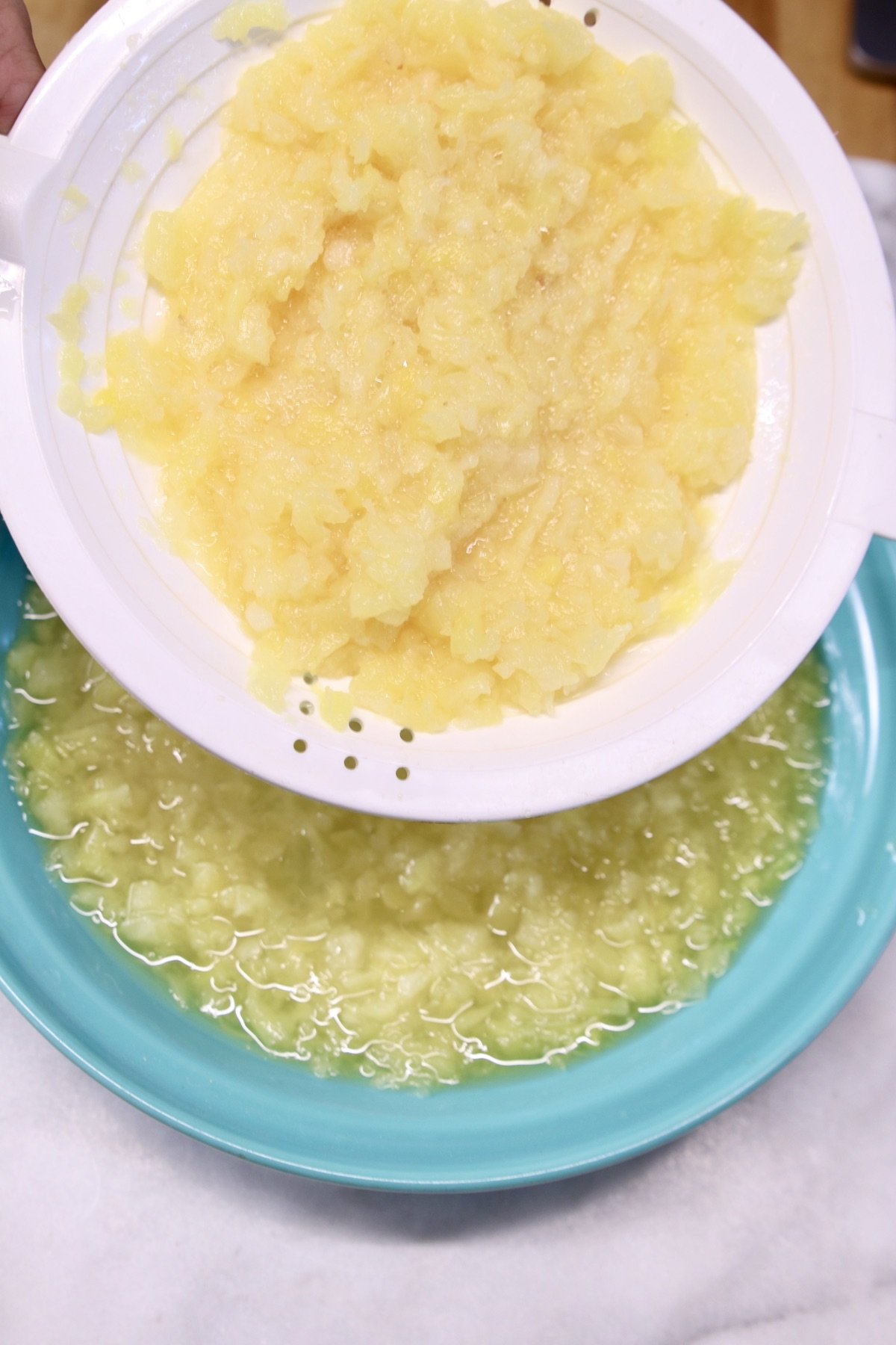 placing pineapple into a pie dish