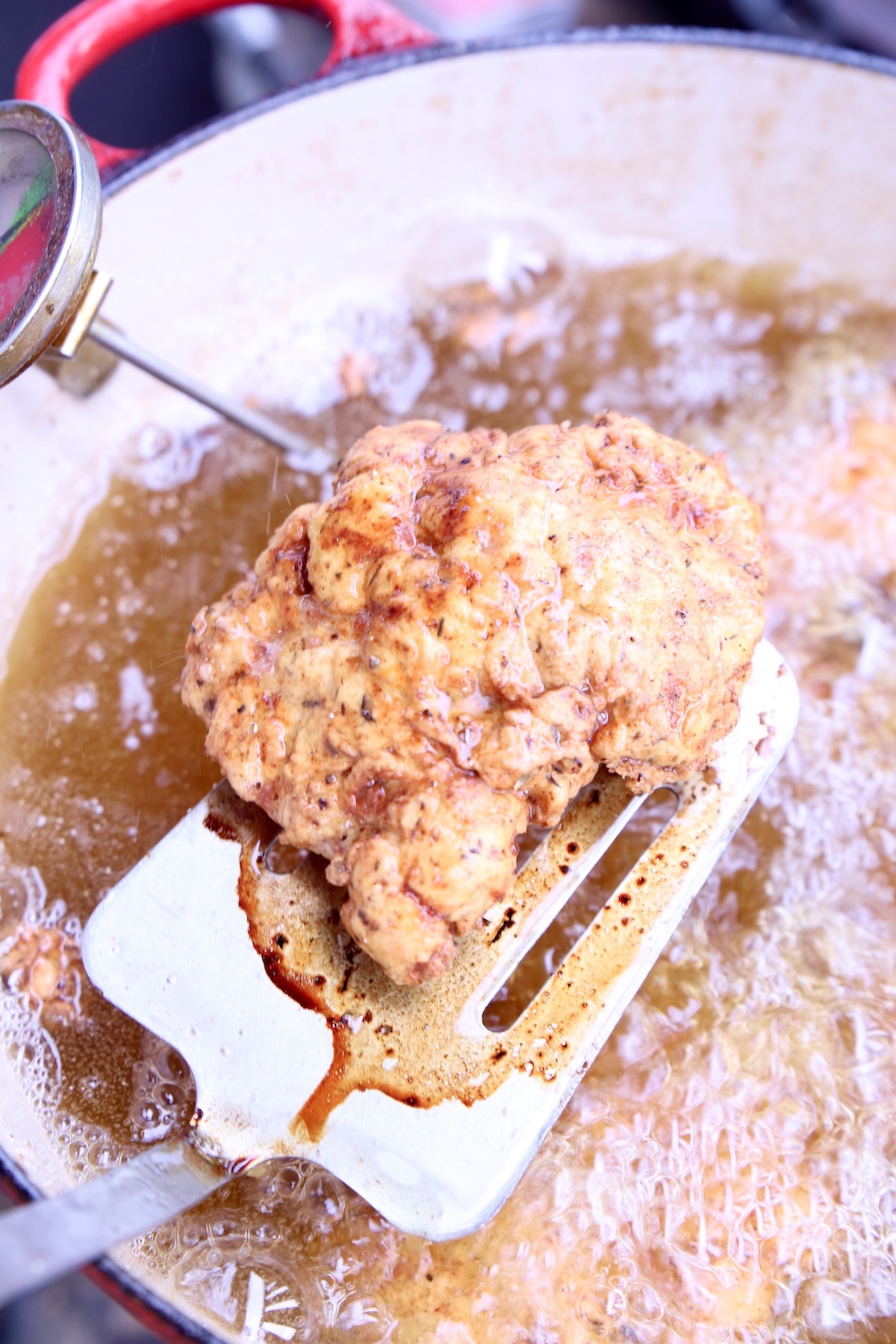 Frying breaded chicken thighs