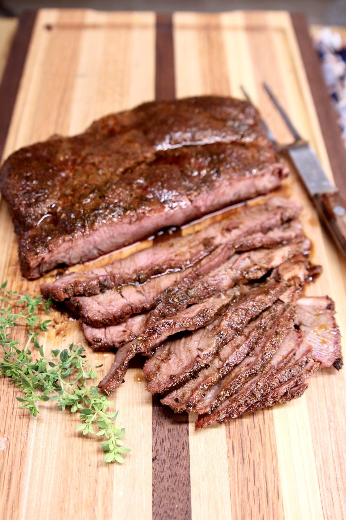Chuck roast on cutting board, sliced