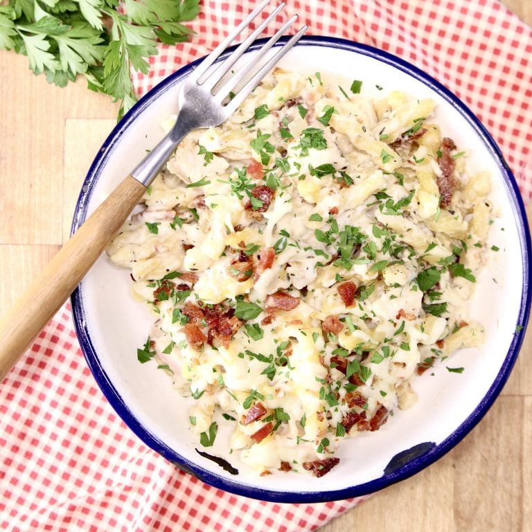 Cheesy Chicken Pasta in a bowl with a fork