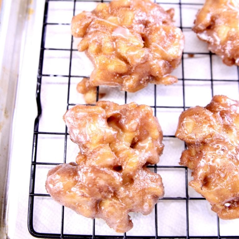 Apple Fritters on a wire rack