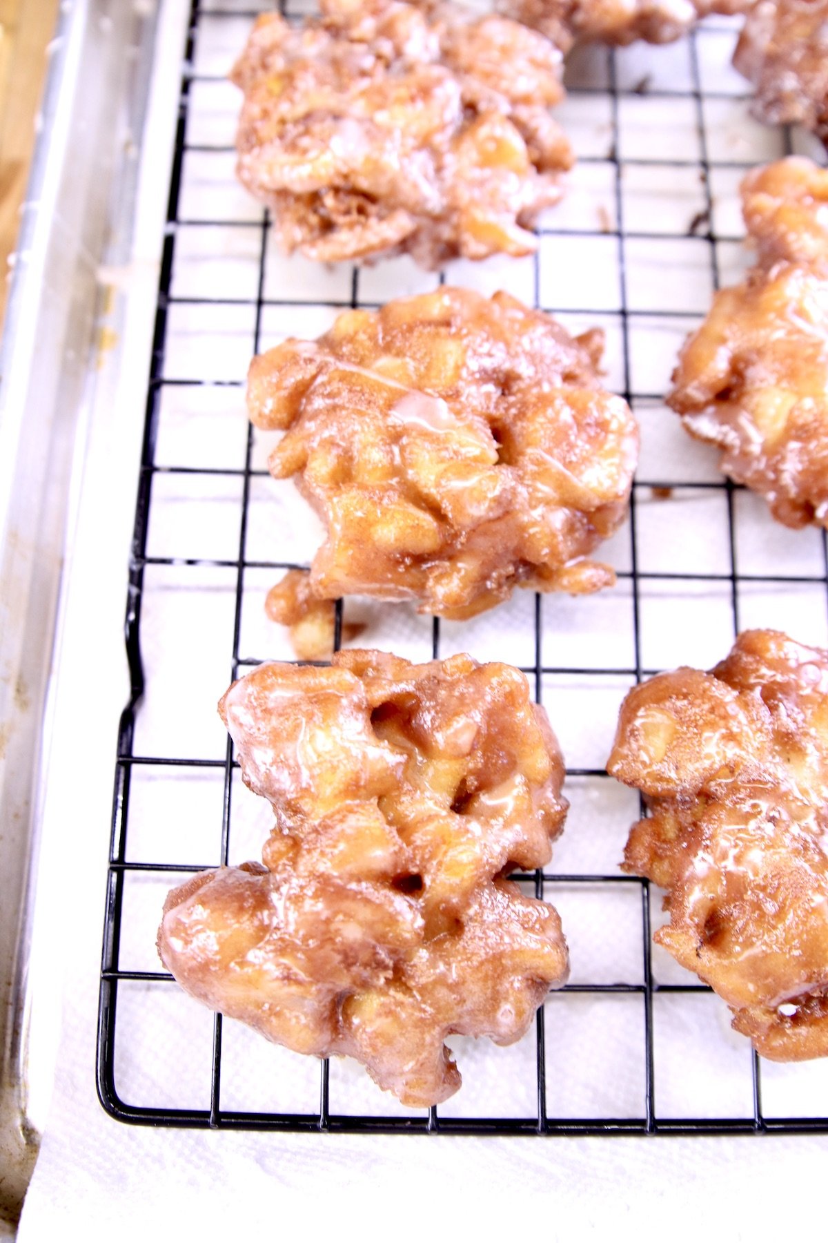 Apple Fritters on a wire rack