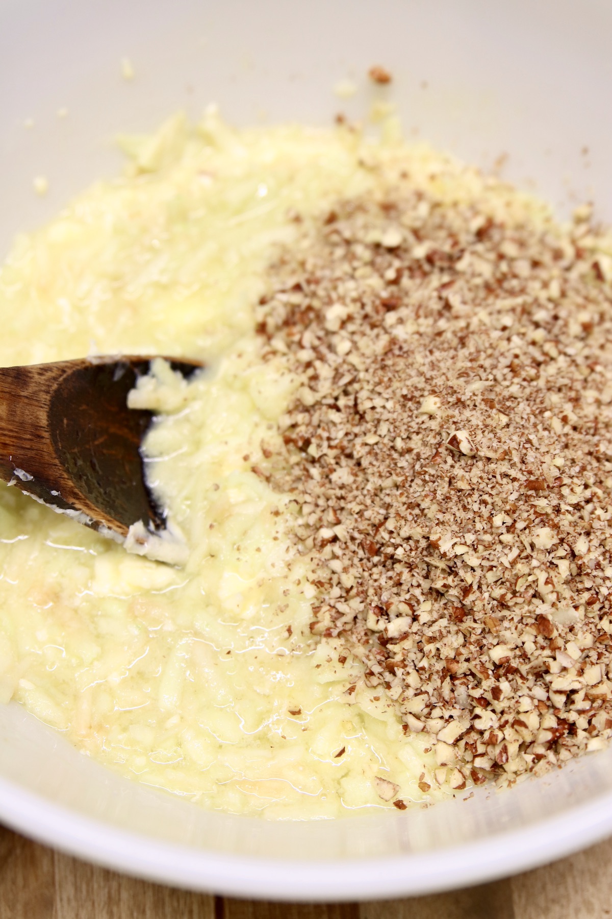 apple bread batter with chopped pecans