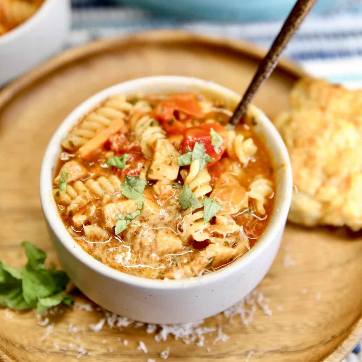 Grilled chicken parmesan soup in a bowl.