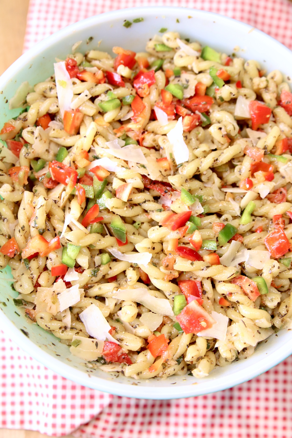 Bowl of Italian Pasta Salad with tomatoes and bell peppers