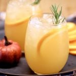 harvest punch cocktail in glasses on a tray