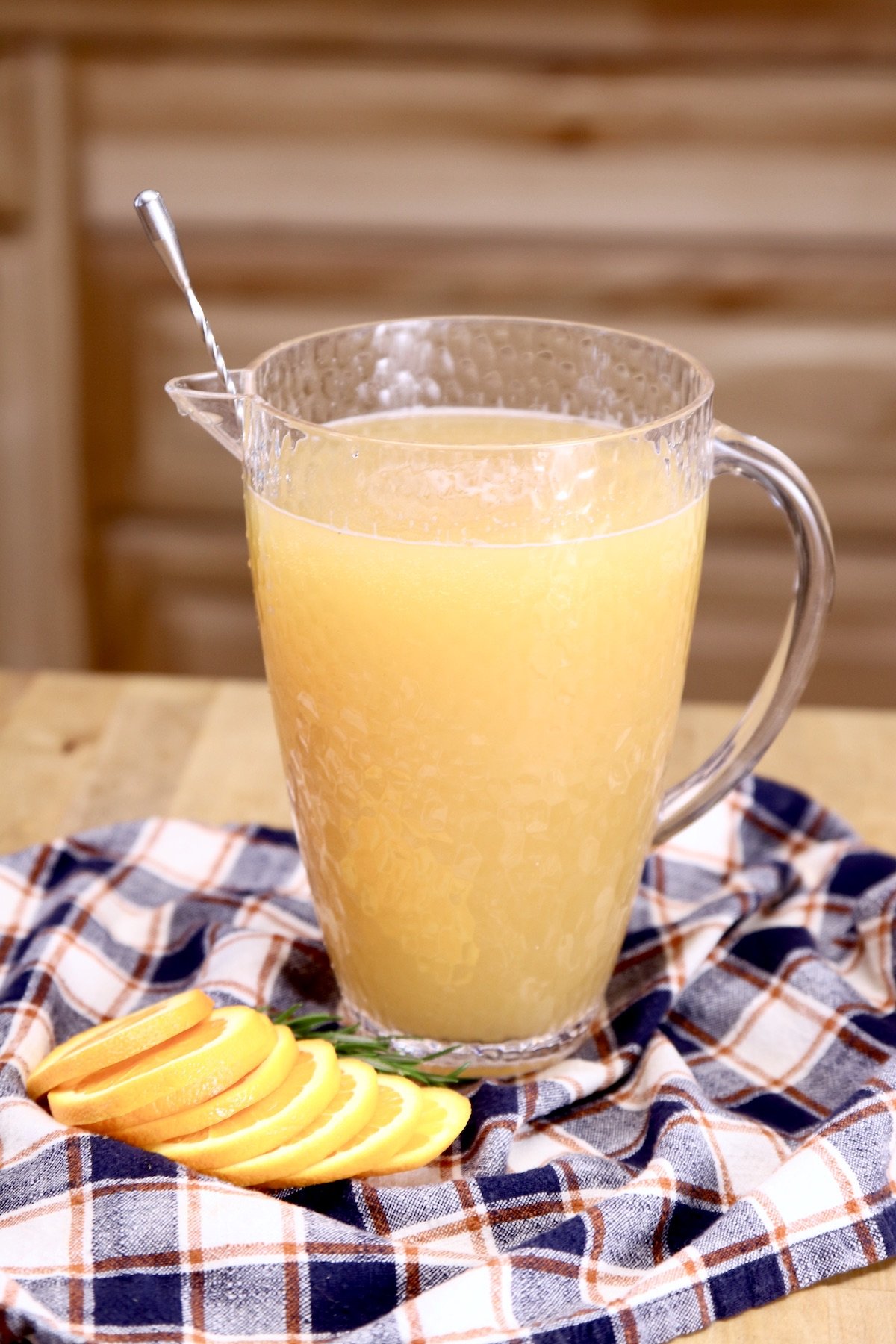 pitcher of punch with moscato wine, apple cider and pineapple juice