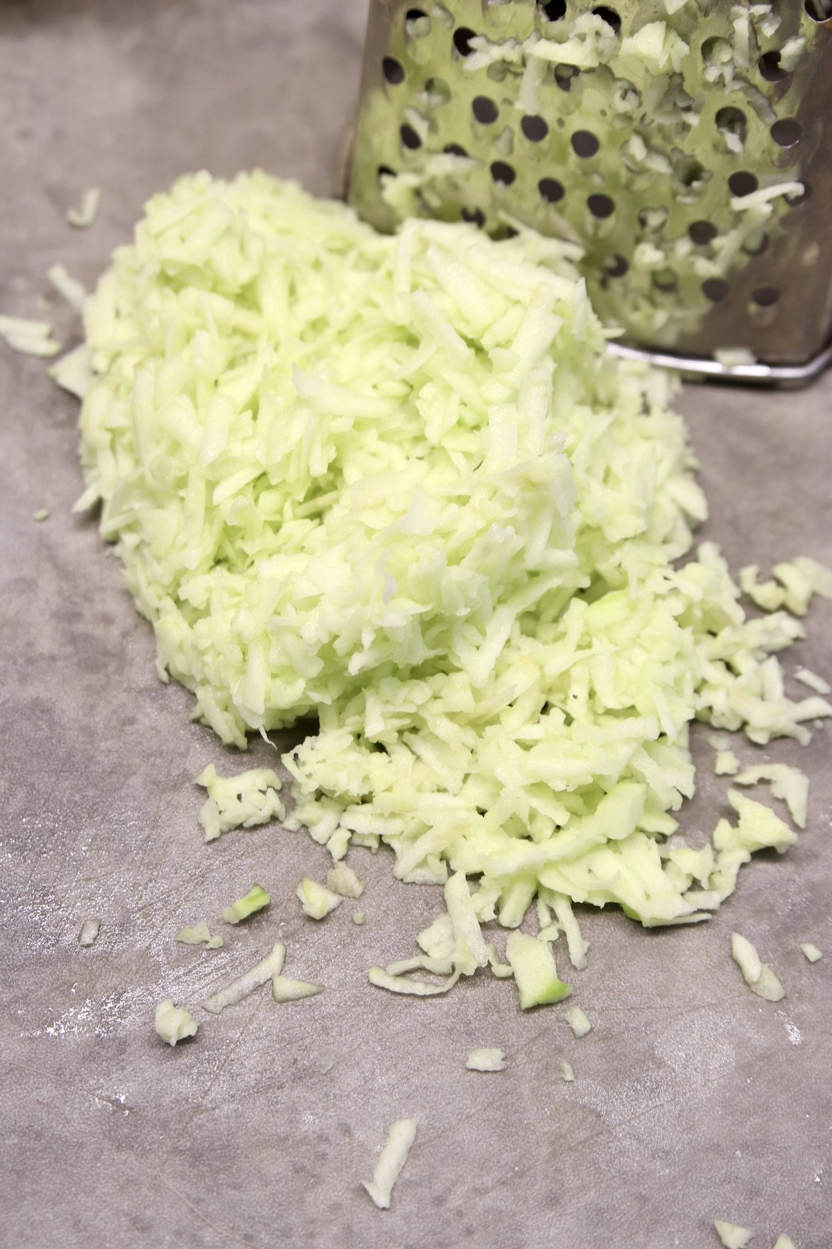 shredded apples with box grater