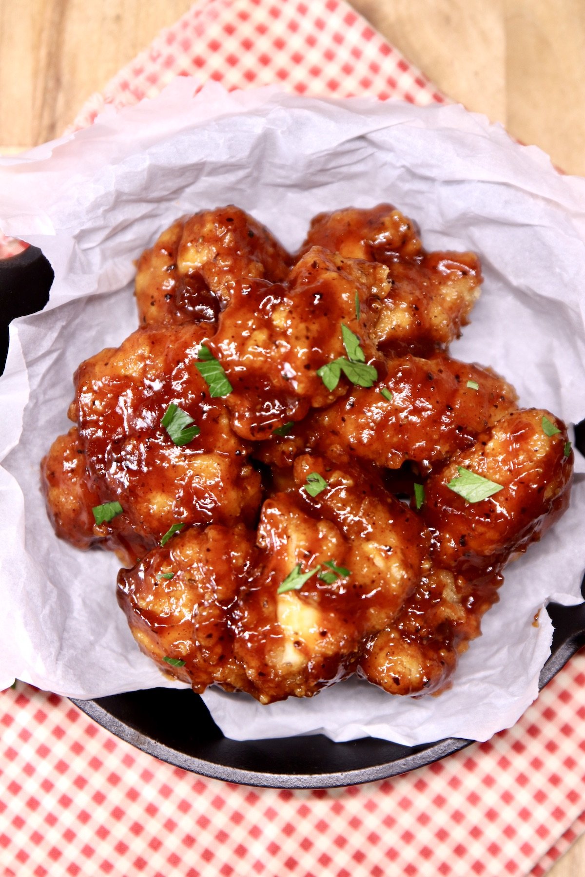 overhead view of bowl of bbq boneless wings