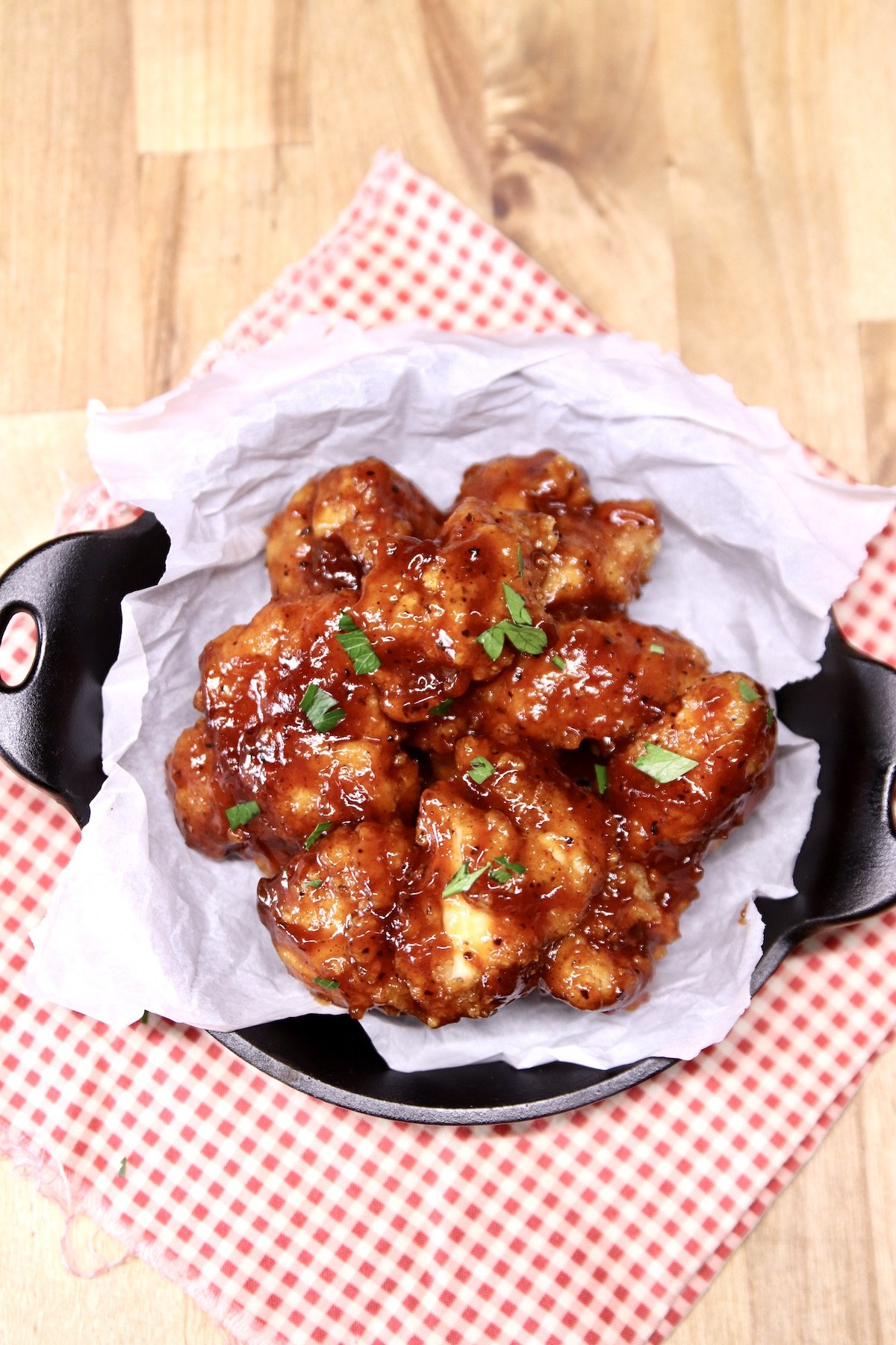 BBQ Boneless Wings in a cast iron dish