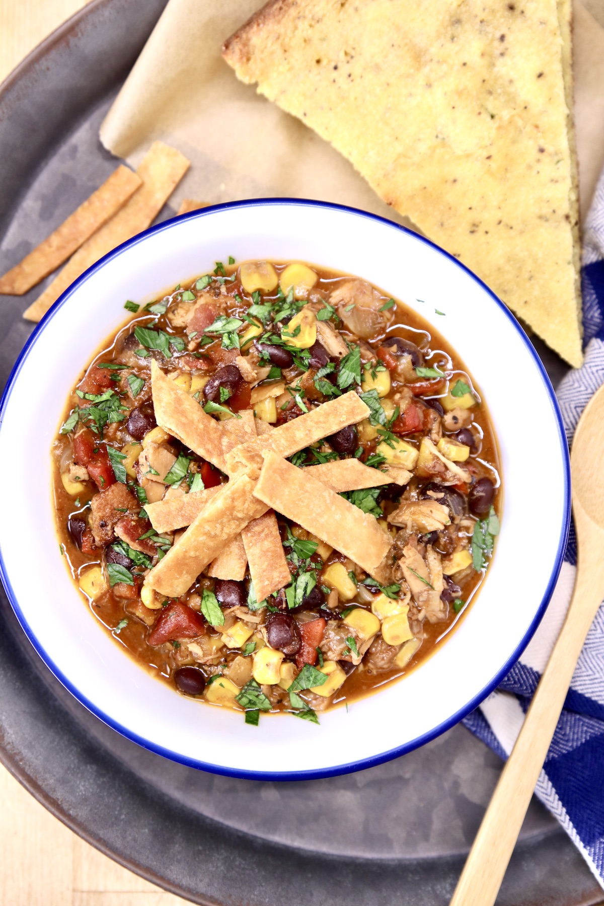 platter with bowl of soup and cornbread