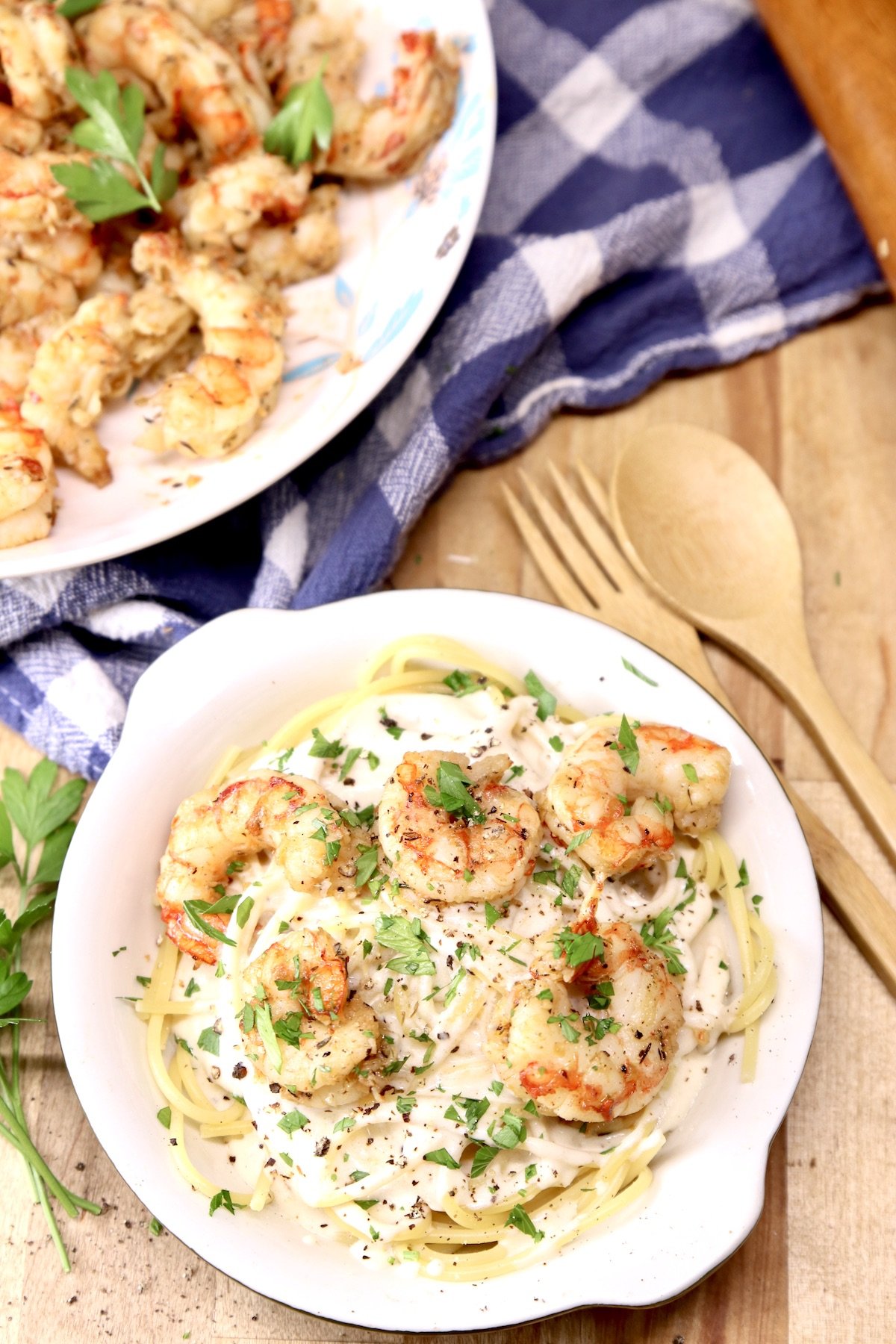 bowl of shrimp spaghetti - pan in background