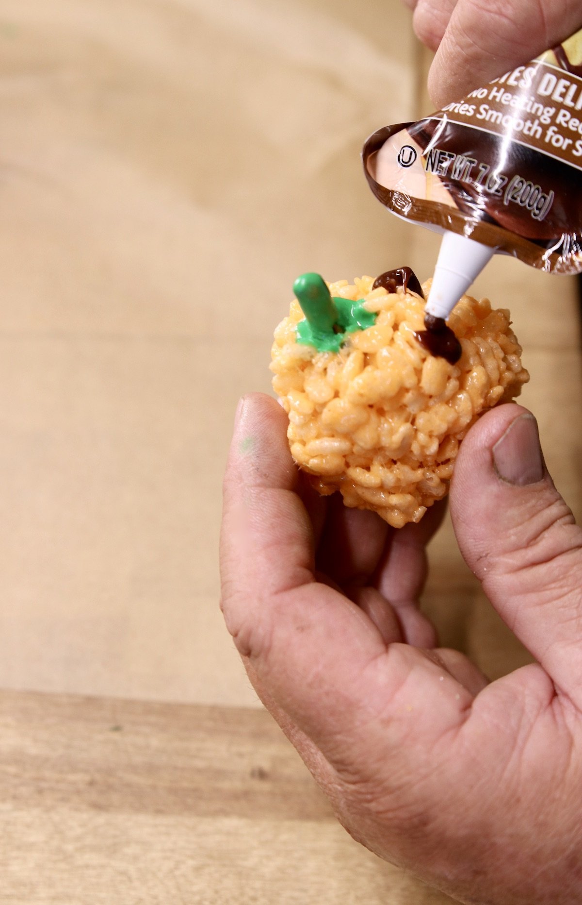 chocolate cookie icing decorating pumpkin rice krispie treats