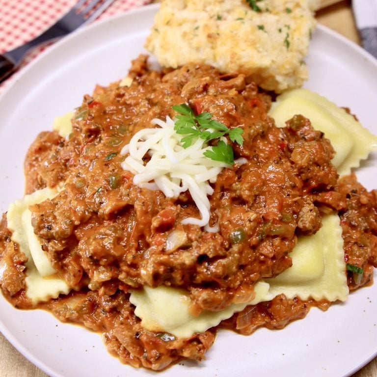 meat sauce over ravioli