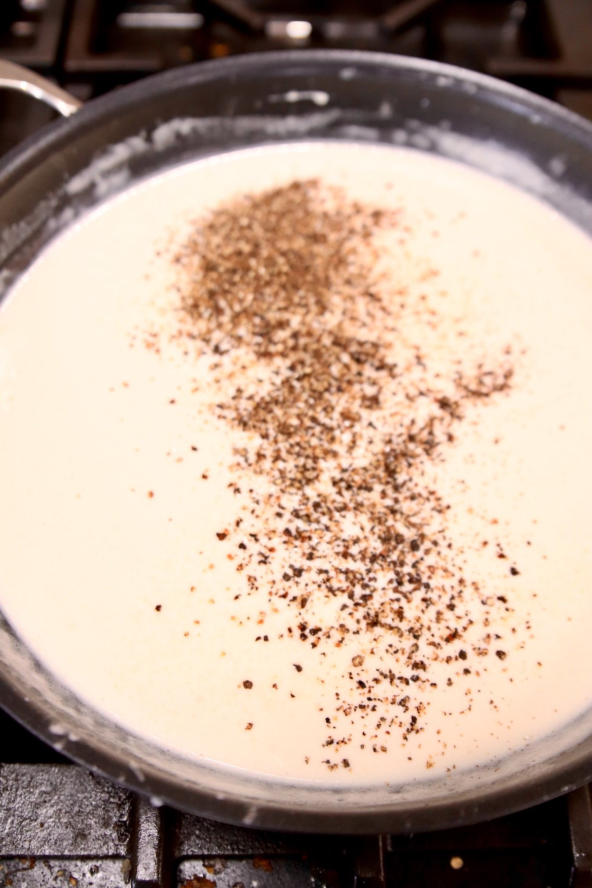 cream sauce with black pepper