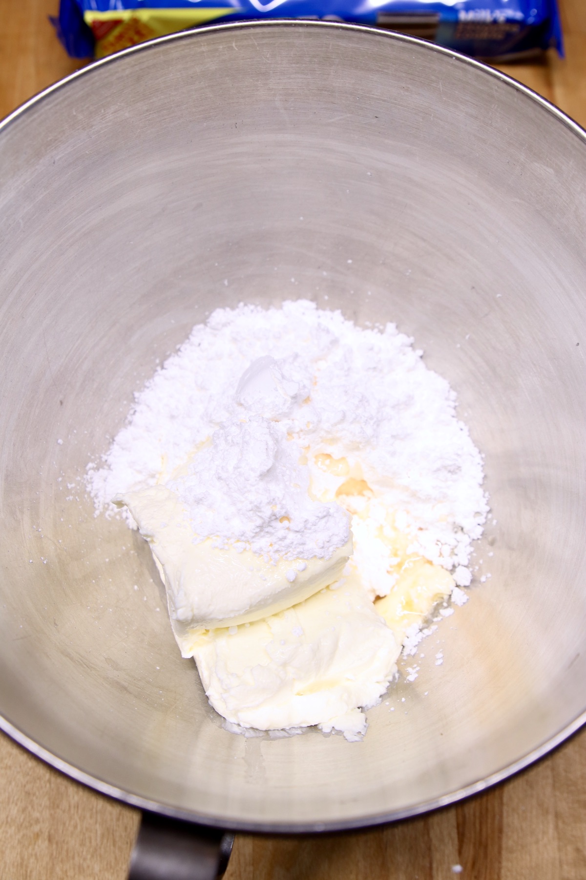 powdered sugar, cream cheese, vanilla in a bowl