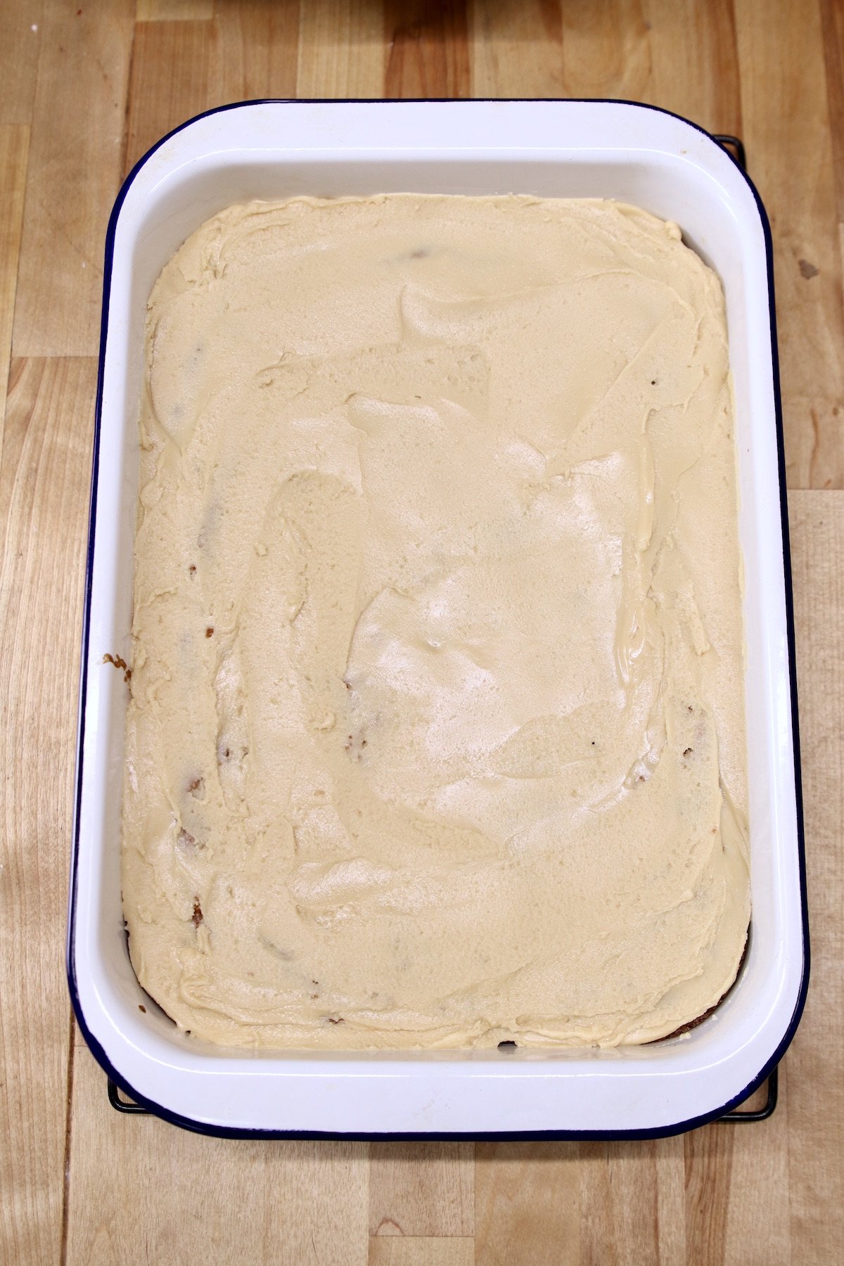 brown sugar icing over pear cake