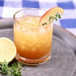 Apple Amaretto Sour Cocktail with apple slice garnish