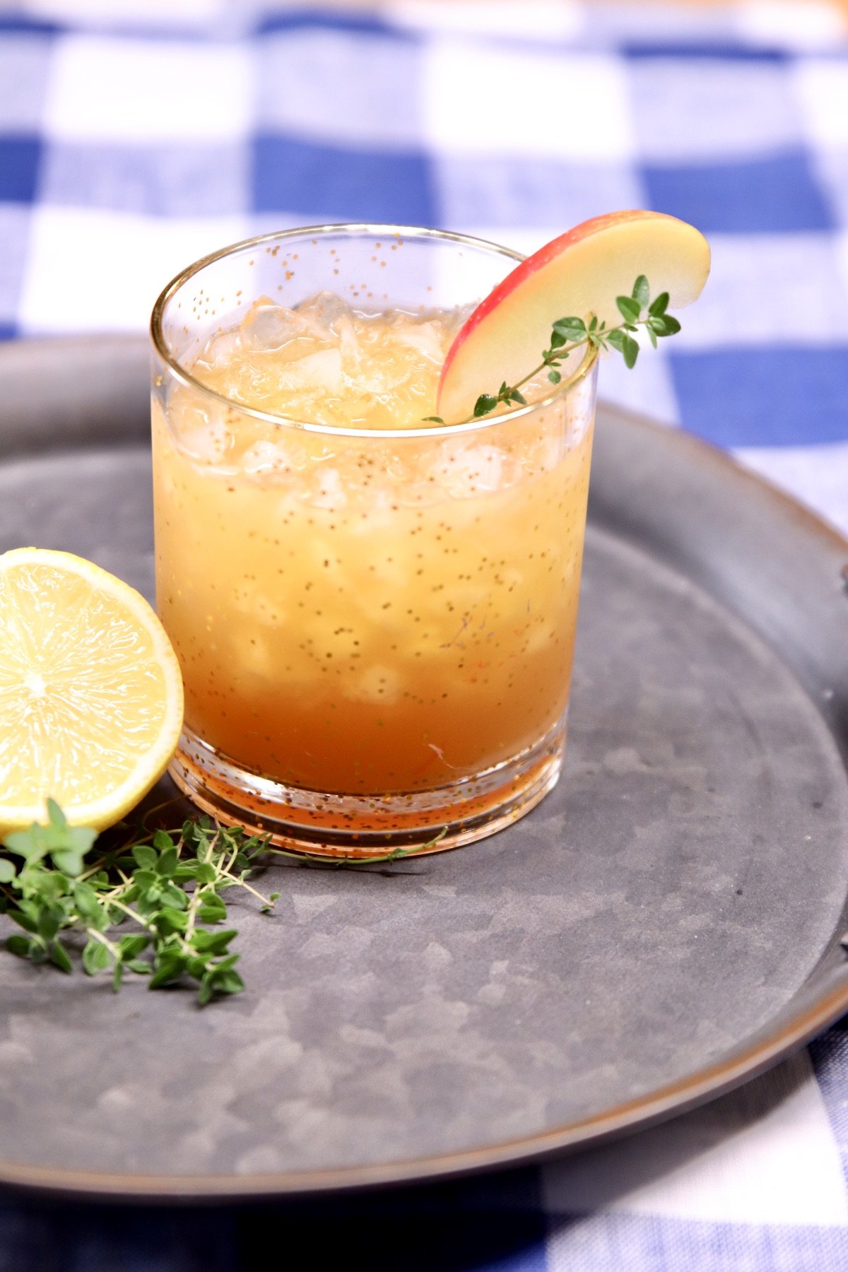 apple cider cocktail with apple garnish