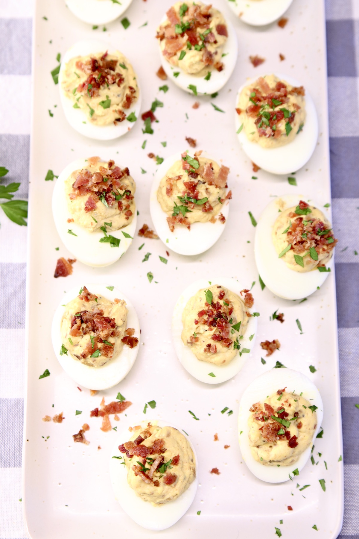 platter of deviled eggs with bacon