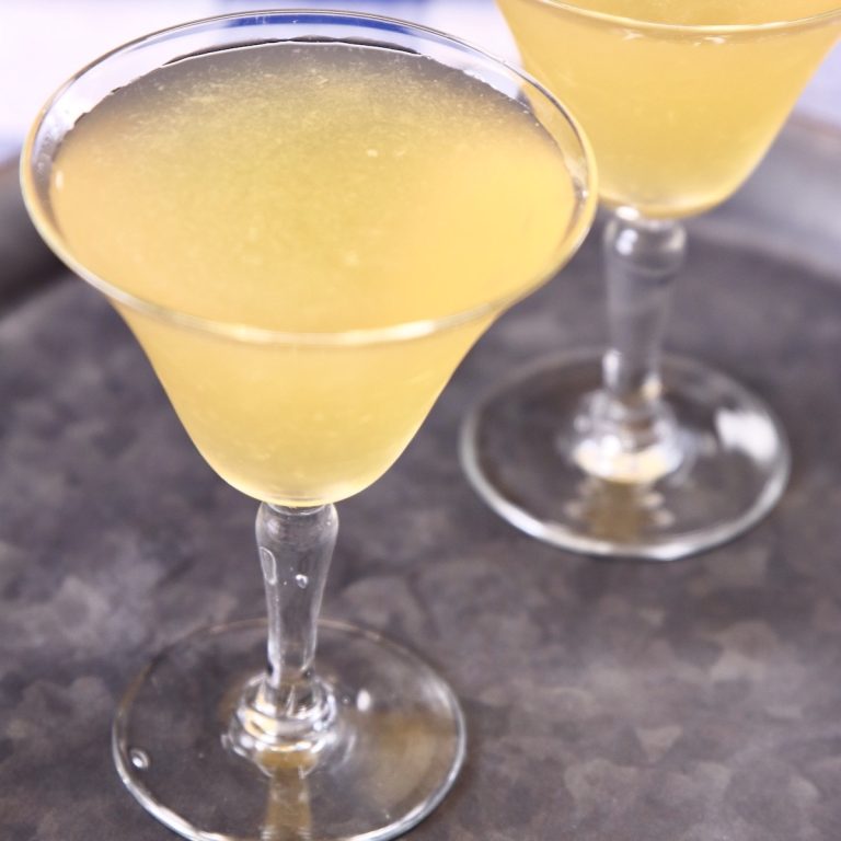2 brandy daisy cocktails in coupe glasses