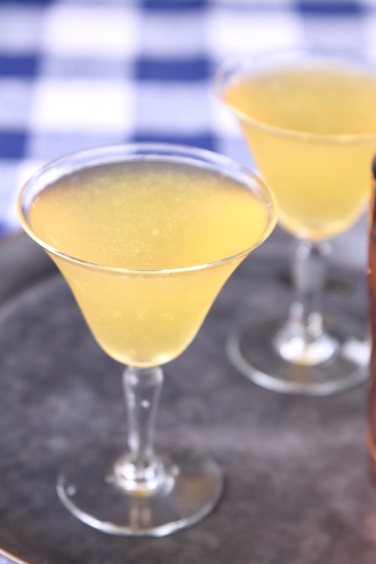 brandy daisy cocktail in 2 glasses on a tray