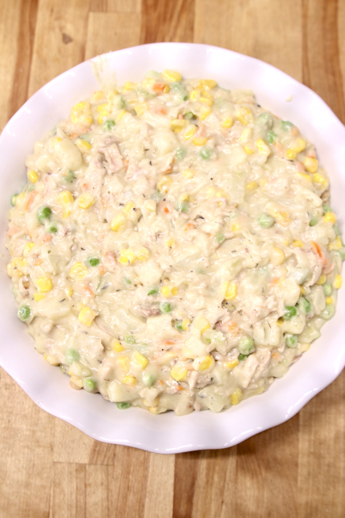 pot pie filling in a pie dish